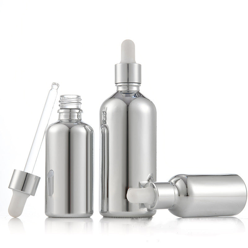 Silver coated essential oil bottles with pipette dropper in various sizes, 10ml to 50ml, featuring a luxurious electroplated finish.
