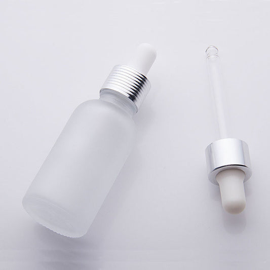 Frosted dropper bottles - 15ml clear glass cosmetic bottle with dropper and silver cap.