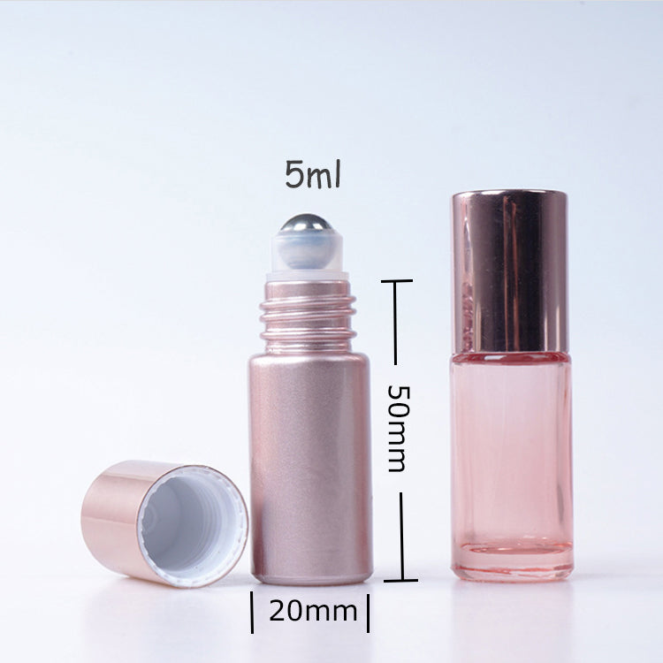 5ml roll-on perfume bottle with glass roller ball, featuring a rose gold cap, ideal for essential oils and fragrances.