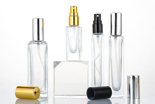 Various mist spray bottles showcasing different designs and spray mechanisms for skincare use.